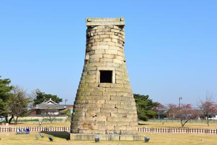 Cheomseongdae Observatory in Gyeongju under a clear blue sky