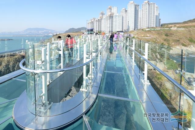Glass walkway above the rocky coast at Oryukdo Skywalk in Busan