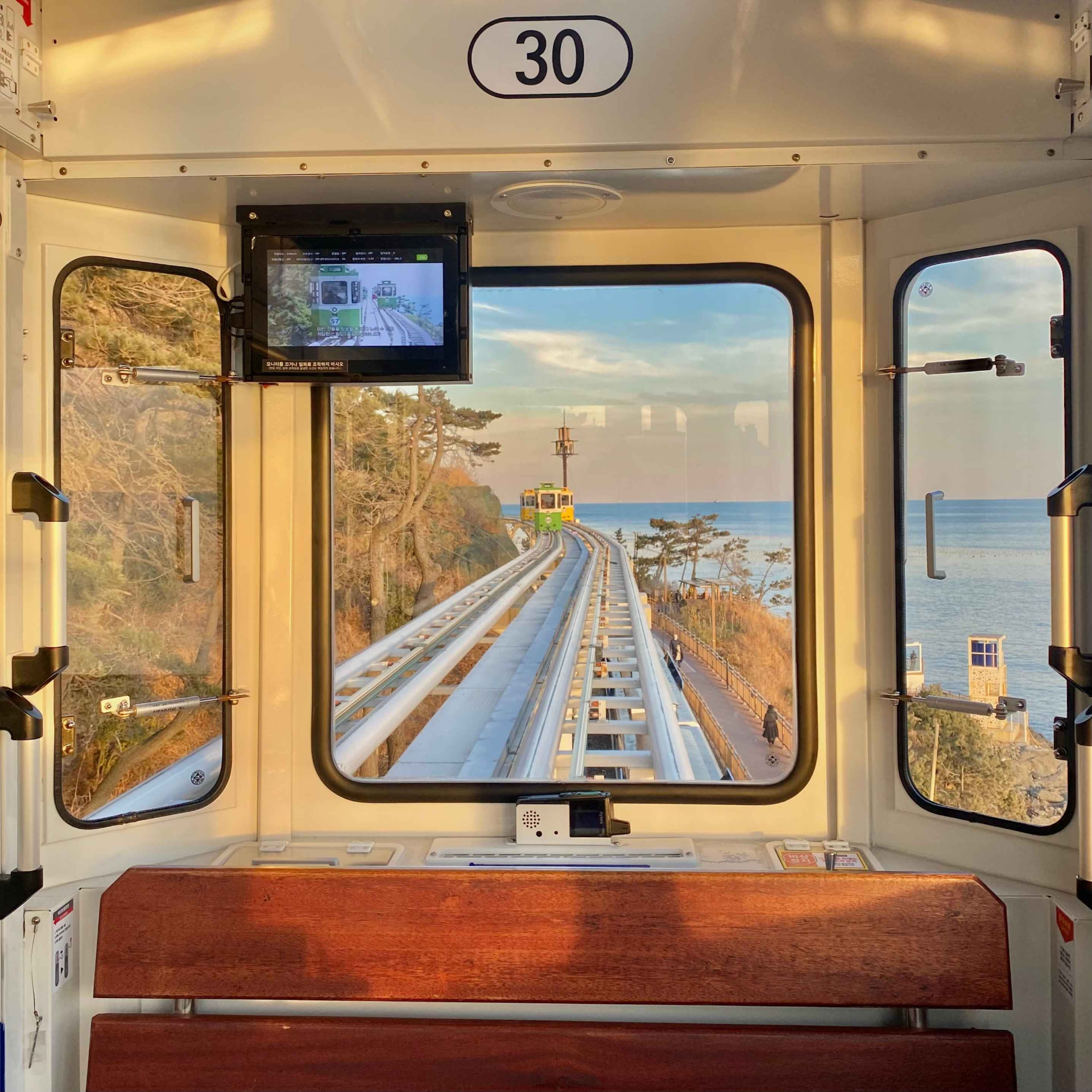 Sea view from inside a Haeundae Blueline Park sky capsule train carriage