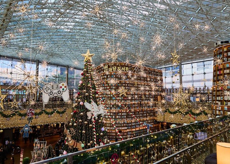 Starfield Library in COEX with towering bookshelves and festive lighting