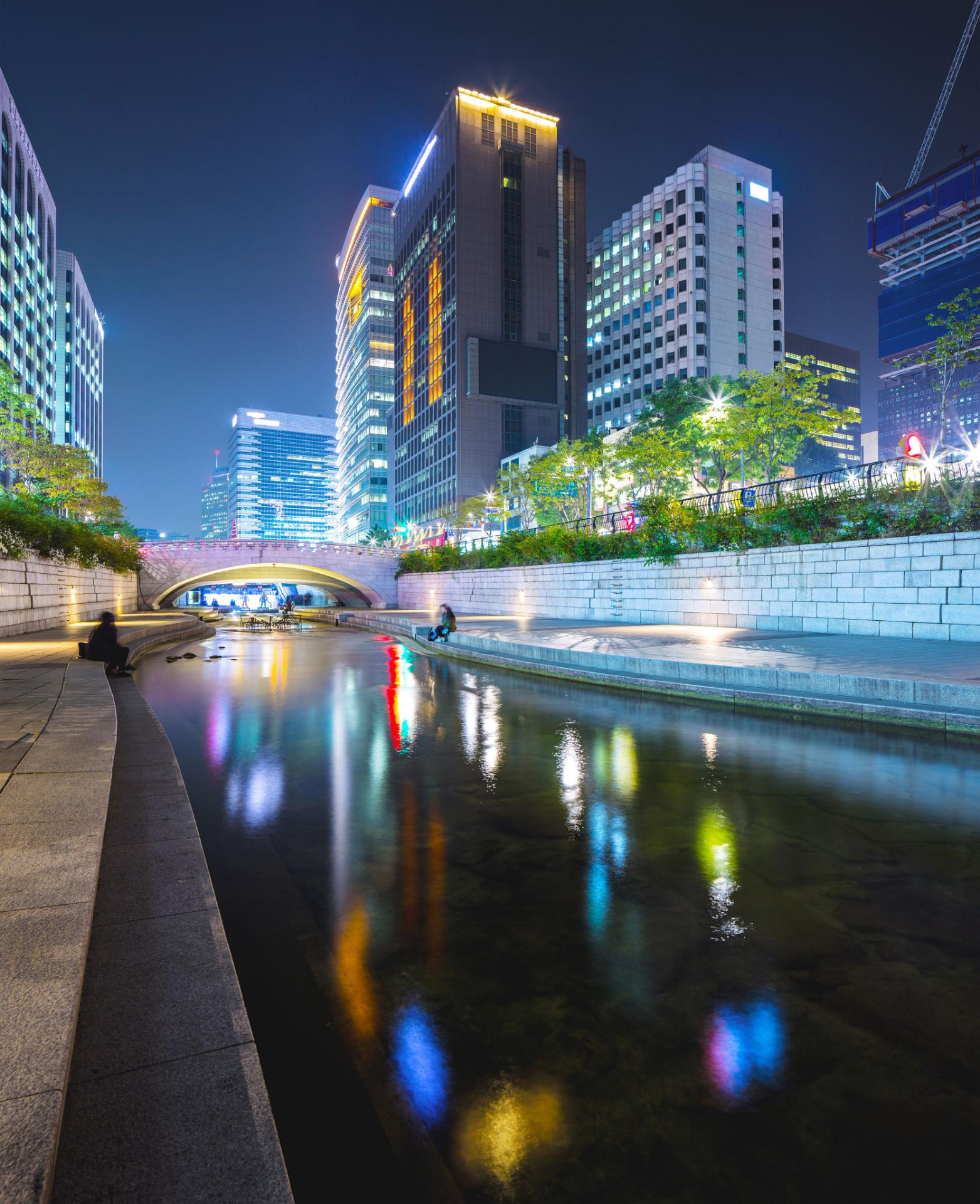 Cheonggyecheon stream reflecting Seoul city lights at night
