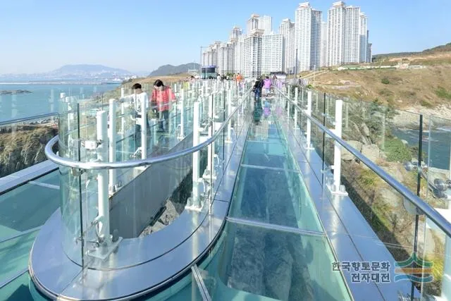Glass walkway above the rocky coast at Oryukdo Skywalk in Busan