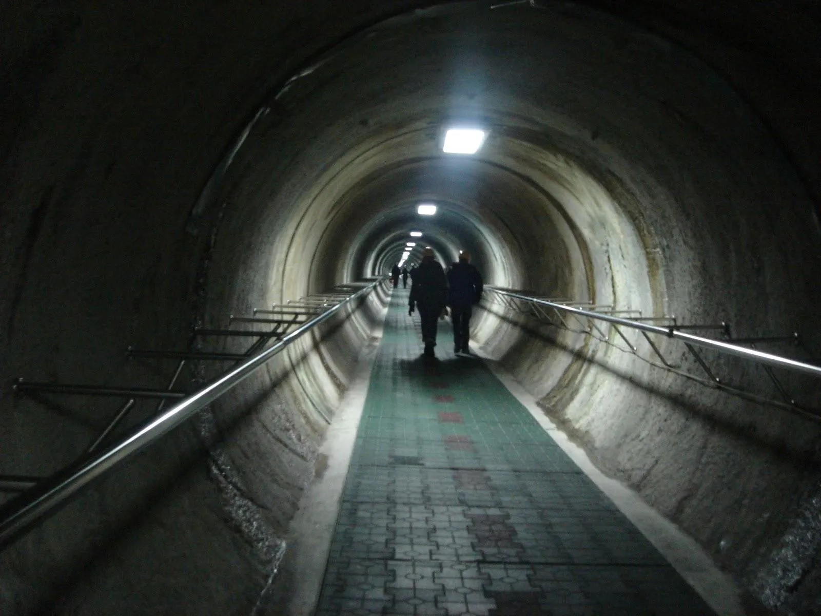 Visitors walking inside the Third Infiltration Tunnel
